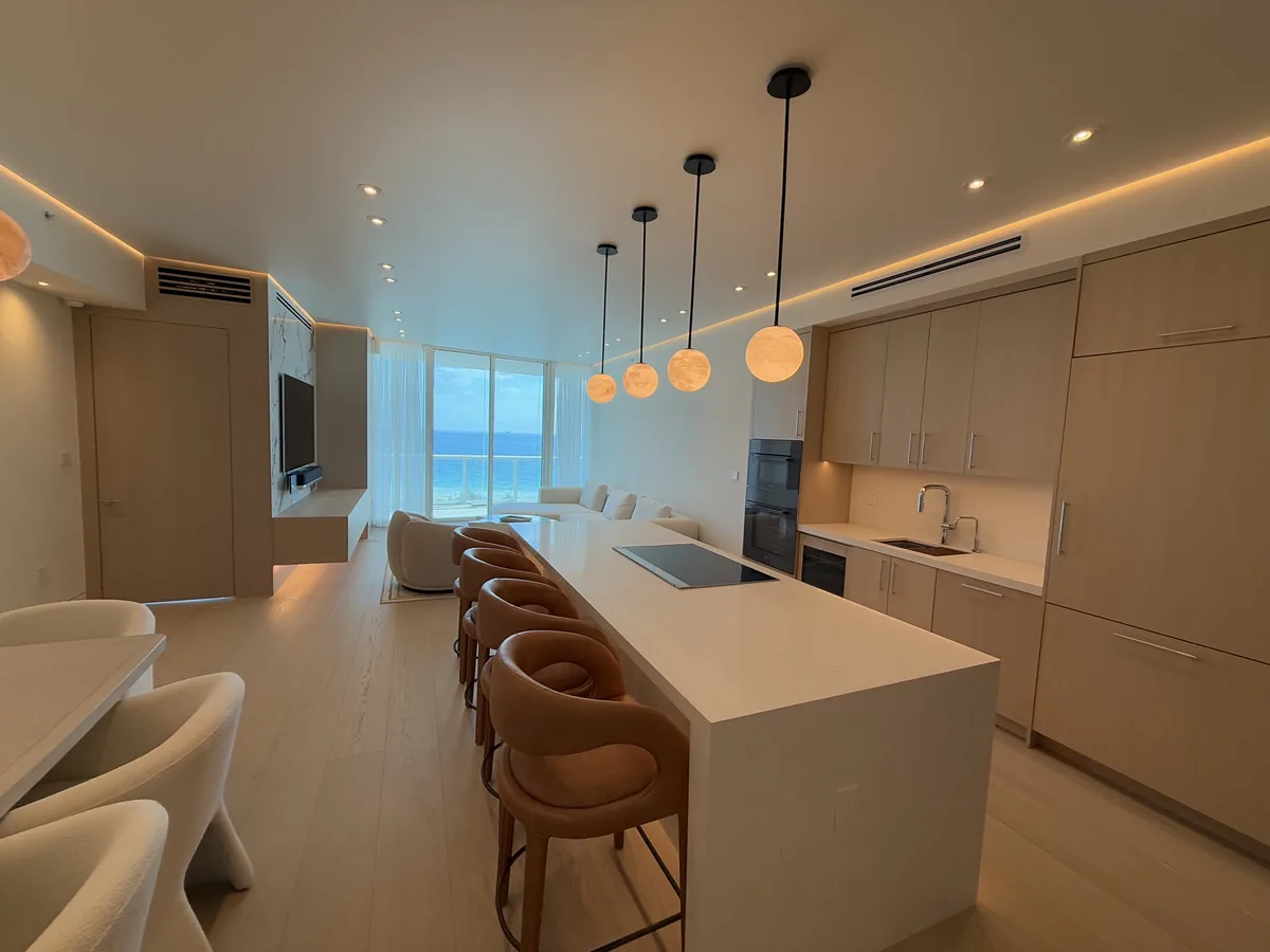 Oceanfront kitchen renovation with alabaster pendants, Continuum South Tower, Miami Beach