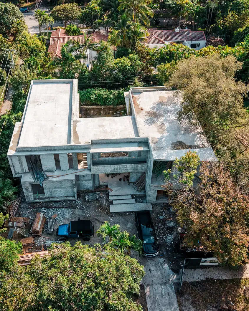 Aerial view of the Kaēlo Residence concrete shell under construction in Miami Shores